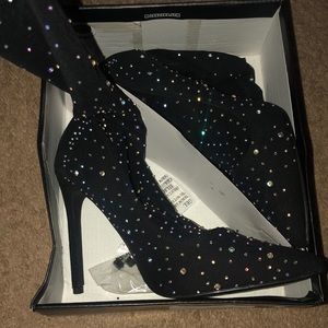 Thigh High heels covered in rhinestones